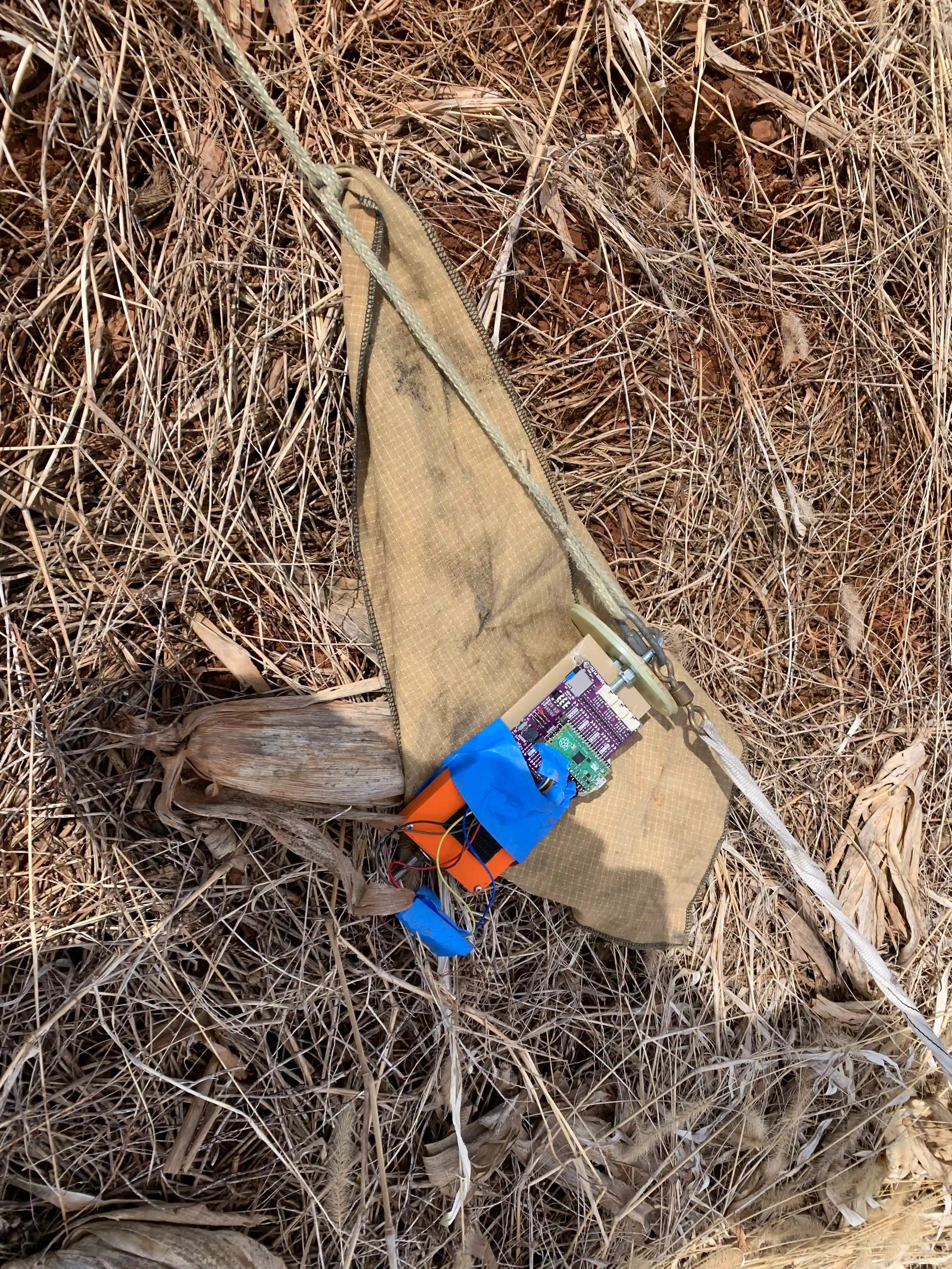 Team recovering avionics bay in the field